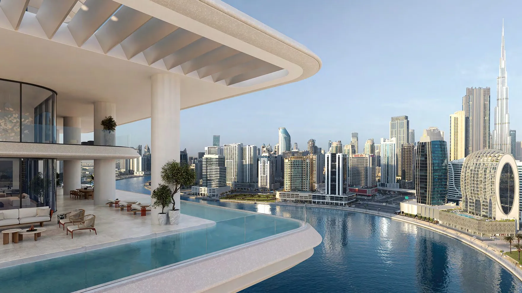 Terrace with infinity pool overlooking Marasi Bay and the Burj Khalifa